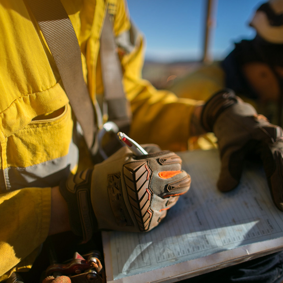 construction worker writing something down