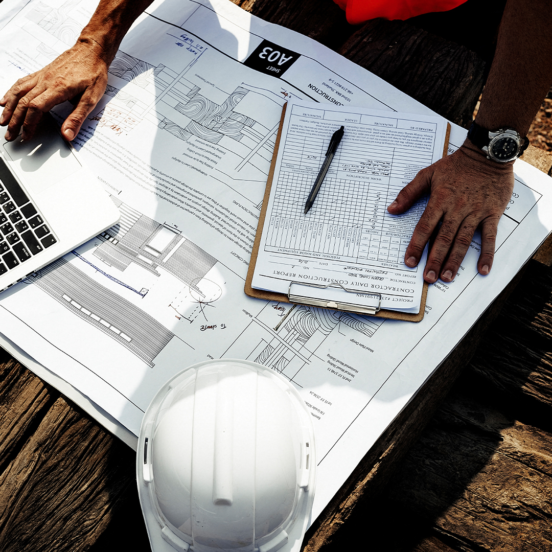 looking over plans and blueprings
