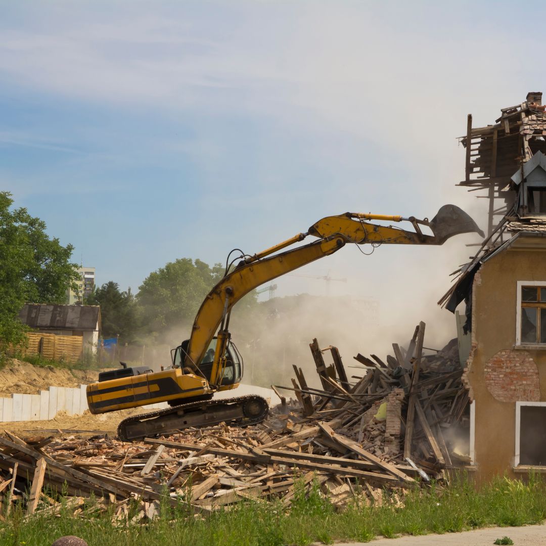 demolishing residential house near trees